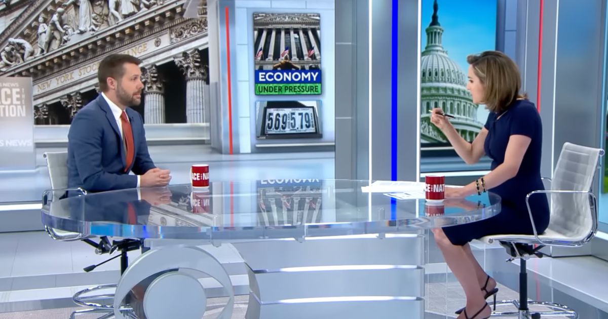 CBS News "Face the Nation" host Margaret Brennan, right, pressed Biden White House top economic advisor Brian Deese, left, over inflation in the U.S., showing him a chart depicting rising inflation since President Joe Biden took office in January 2021.