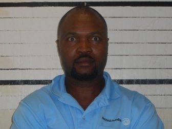 A mugshot of Michael Louis.