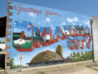 A mural with the words, "Greetings from...Oklahoma City," is seen in this photo.