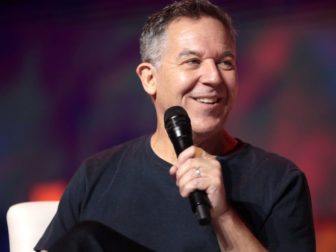 Greg Gutfeld speaking with attendees at the 2022 Student Action Summit at the Tampa Convention Center in Tampa, Florida.