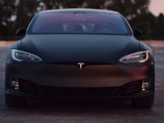 Photo of a black Tesla.