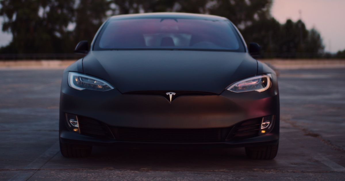 Photo of a black Tesla.