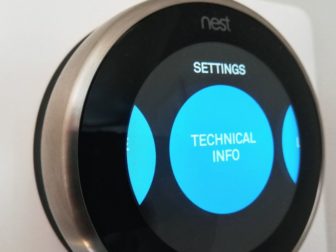 A Google Nest Thermostat is seen in this photo.