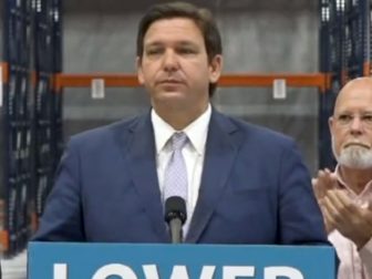 Florida Governor Ron Desantis speaks to an audience.