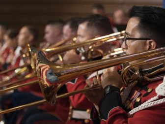 A United States Marine Corps band performs.