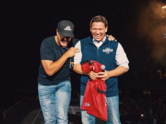 Country star Luke Bryan responded to criticism for inviting Florida Gov. Ron DeSantis onstage during a concert in Jacksonville on Friday.