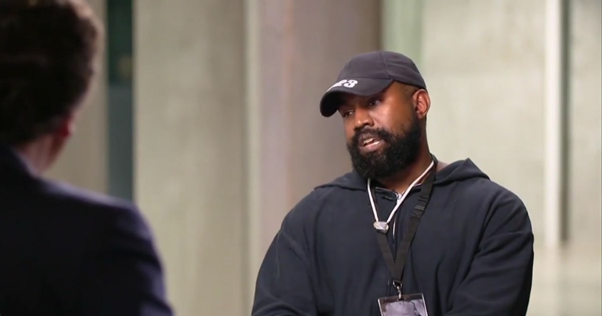 Ye talking with Tucker Carlson during an interview