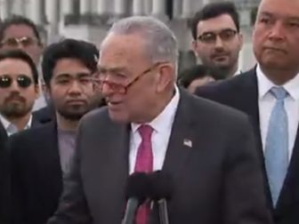 Senate Majority Leader Chuck Schumer addresses reporters outside the Capitol on Wednesday.