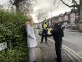 Isabel Vaughan-Spruce speaks with police before being arrested for praying near an abortion clinic in Birmingham, England. (Fox News / video scr