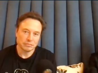 Elon Musk is seen on a podcast on Saturday.