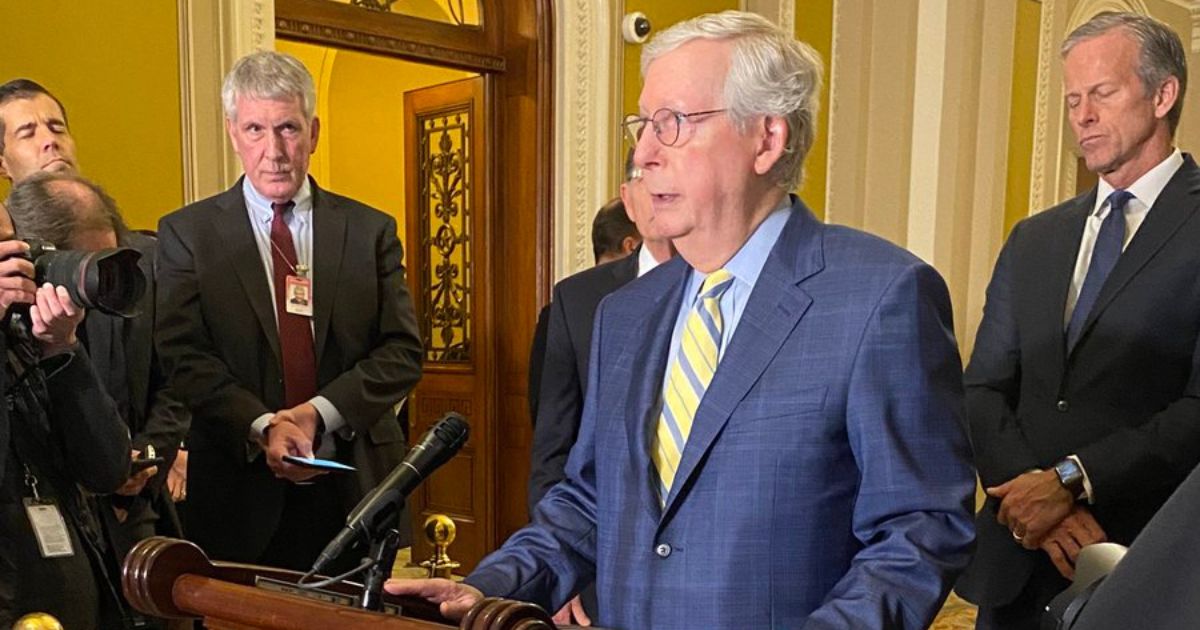 Senate Minority Leader Mitch McConnell is trying to pass a new spending bill with the Democrats.