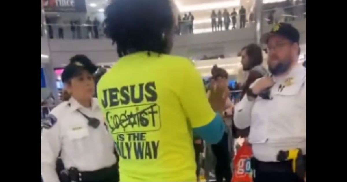 A man is asked to change his shirt in a Bloomington, Minnesota, mall.