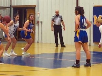 The Mid Vermont Christian School girls basketball team is in action against Poultney High School in December.