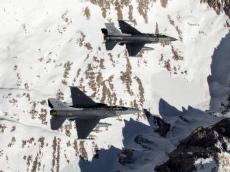 Two F-16 Fighting Falcons test APG-AESA radar as they fly over Edwards Air Force Base, California, on March 20, 2017. The Falcons are assigned to the 416th Flight Test Squadron.