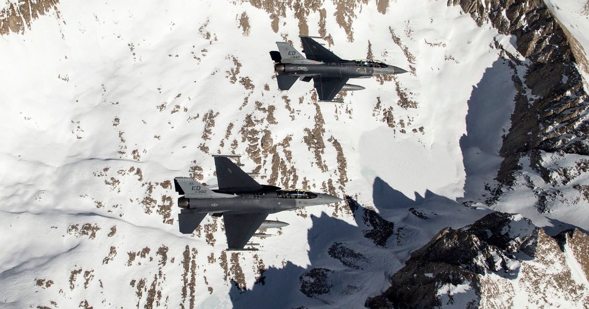 Two F-16 Fighting Falcons test APG-AESA radar as they fly over Edwards Air Force Base, California, on March 20, 2017. The Falcons are assigned to the 416th Flight Test Squadron.