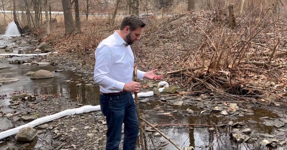 Ohio Sen. J.D. Vance visits a creek near East Palestine, Ohio.