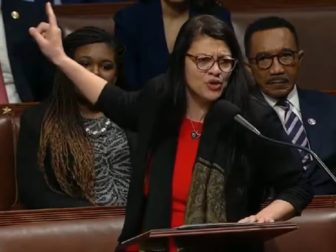 Rep. Rashida Tlaib is seen during Thursday's debate on removing Rep. Ilhan Omar from the House Foreign Affairs Committee.