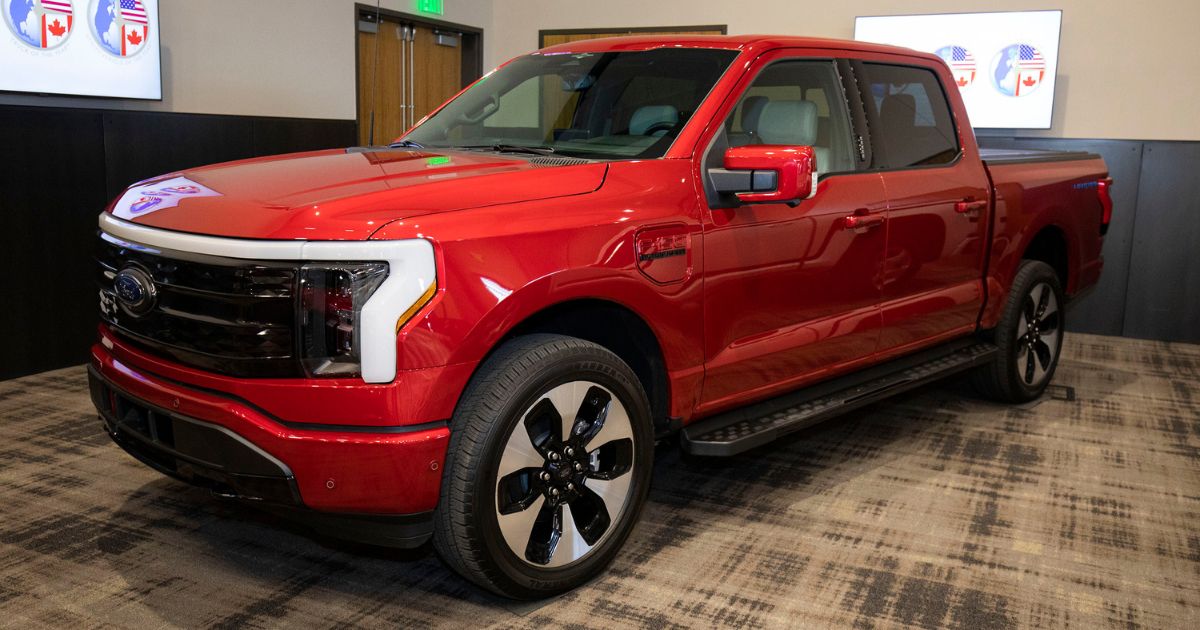 The 2023 Ford F-150 Lightning truck is shown after winning the NACTOY 2023 North American Truck of The Year Award at the 2023 North American Car, Truck, and Utility Vehicle of the Year Awards on Jan. 11 in Pontiac, Michigan.