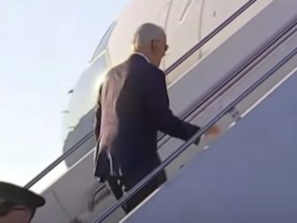 President Joe Biden boards Air Force One on Sunday.