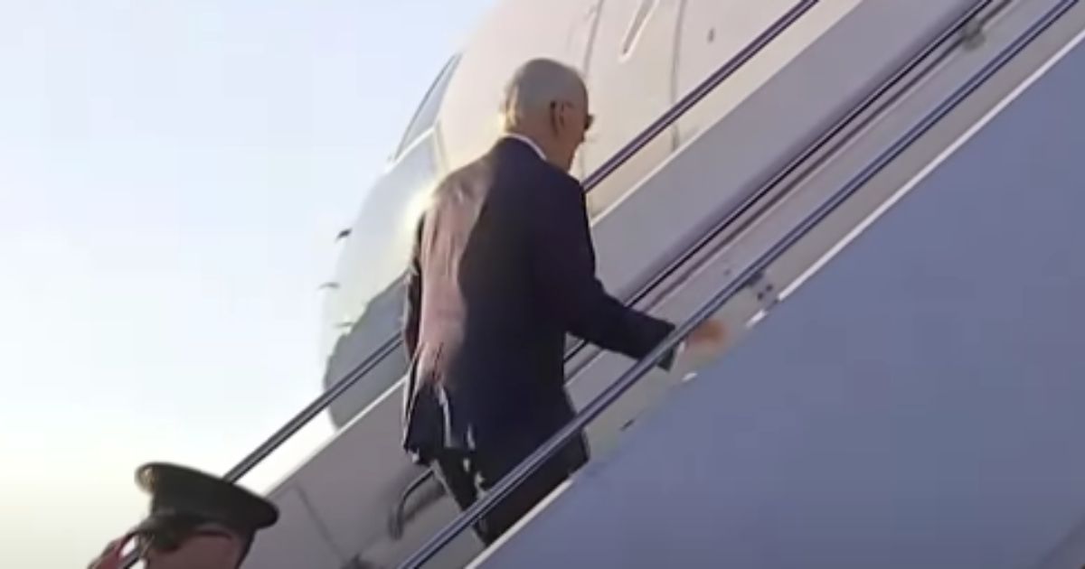 President Joe Biden boards Air Force One on Sunday.