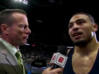 Penn State wrestler Aaron Brooks is interviewed after winning the NCAA wrestling championship.