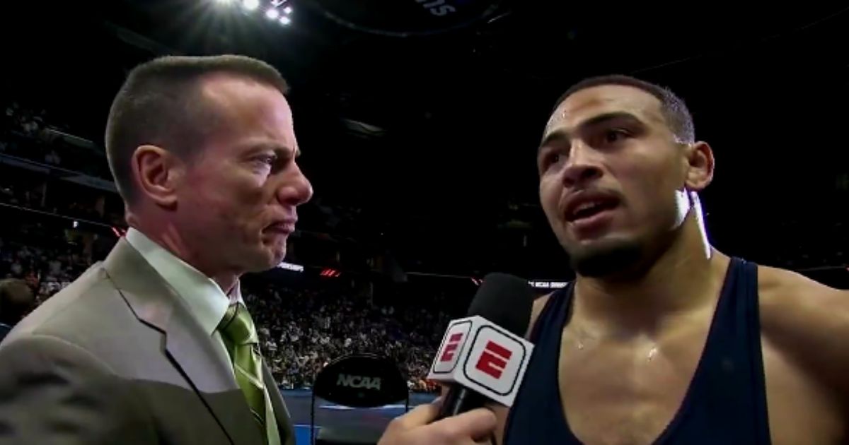 Penn State wrestler Aaron Brooks is interviewed after winning the NCAA wrestling championship.