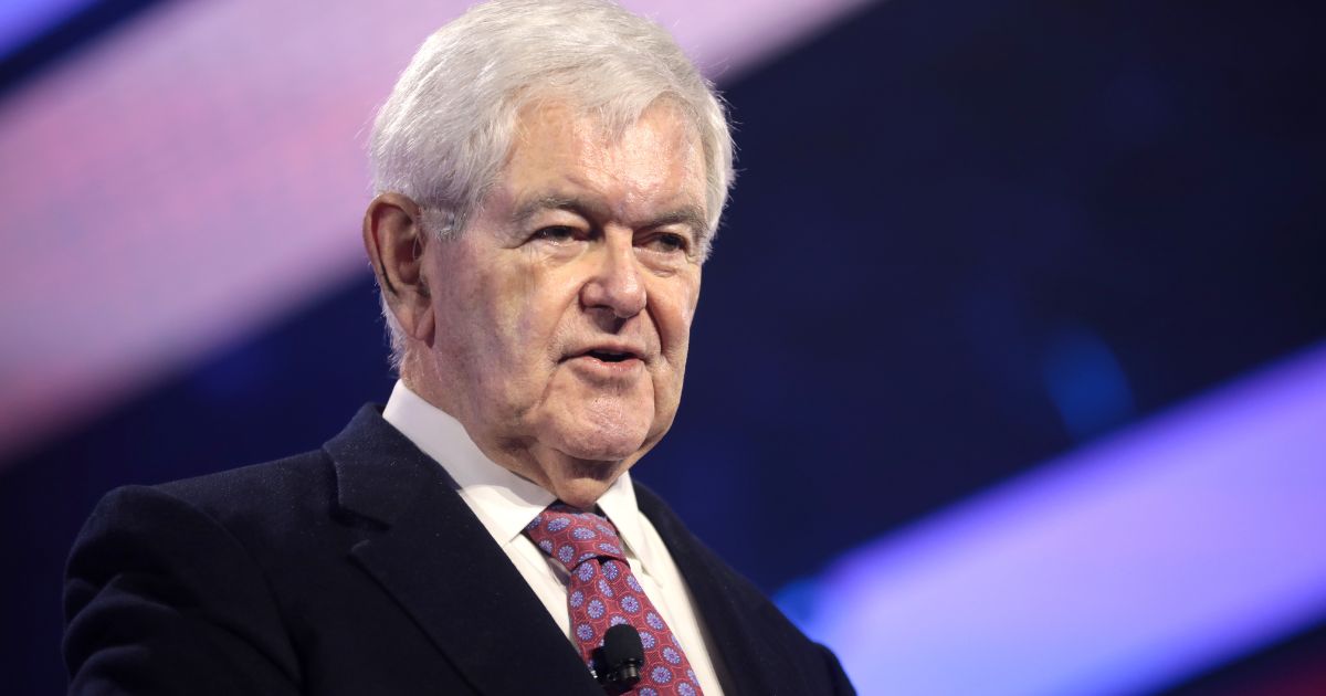 Former Speaker of the House Newt Gingrich speaking with attendees at the 2022 AmericaFest at the Phoenix Convention Center in Phoenix