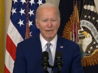 President Joe Biden struggles to read a poem from a teleprompter on Tuesday at the White House.