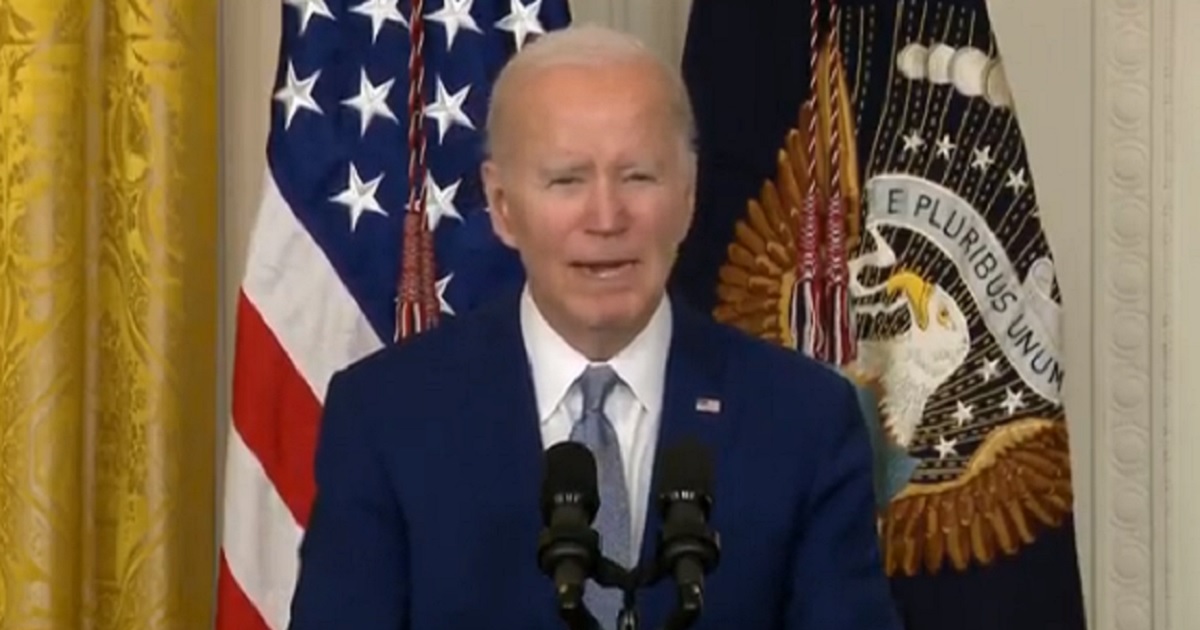 President Joe Biden struggles to read a poem from a teleprompter on Tuesday at the White House.