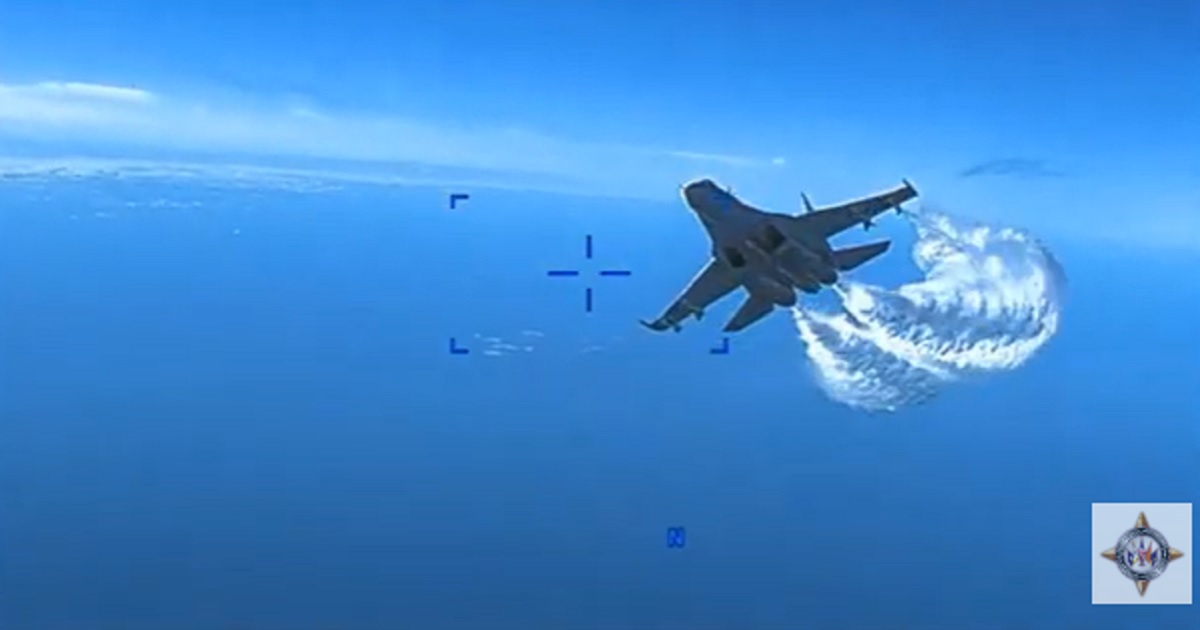 Video released by the Pentagon shows a Russin jet approaching a U.S. drone over the Black Sea.