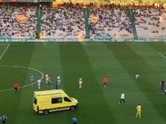 An ambulance on the field of a soccer match in Cordoba, Spain, on Saturday to treat a player who suffered a cardiac arrest.