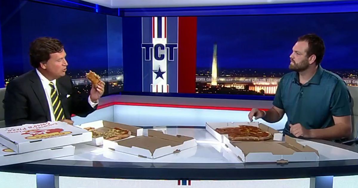 Tucker Carlson eats pizza on the last episode of his Fox News show