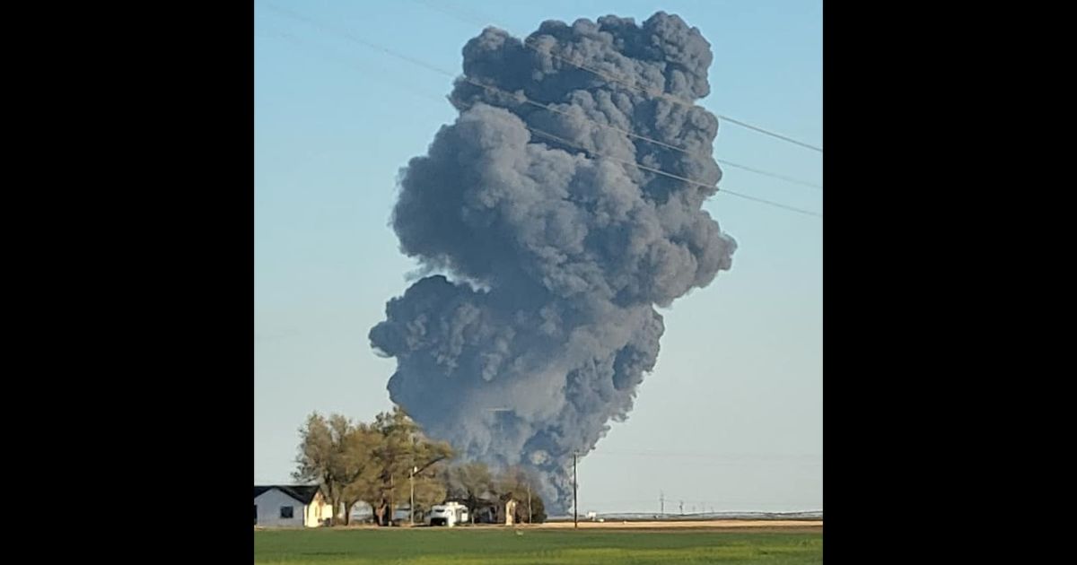 Smoke rises from Southfork Dairy Farms near Dimmitt, Texas