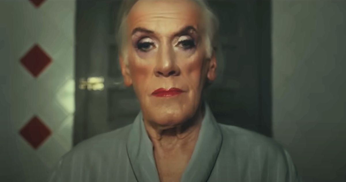 A commercial for J&B Scotch features an old man dressing in drag.