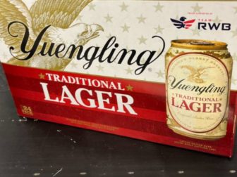 A case of Yuengling beer is pictured in a checkout line.