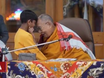 The Dalai Lama is pictured with a young boy in northern India during an encounter that is making news now.