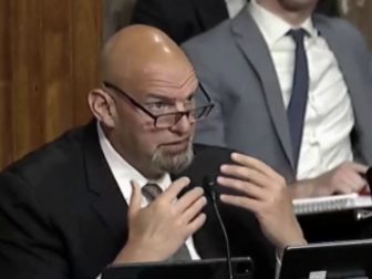 Sen. John Fetterman speaks during a Senate hearing Tuesday.