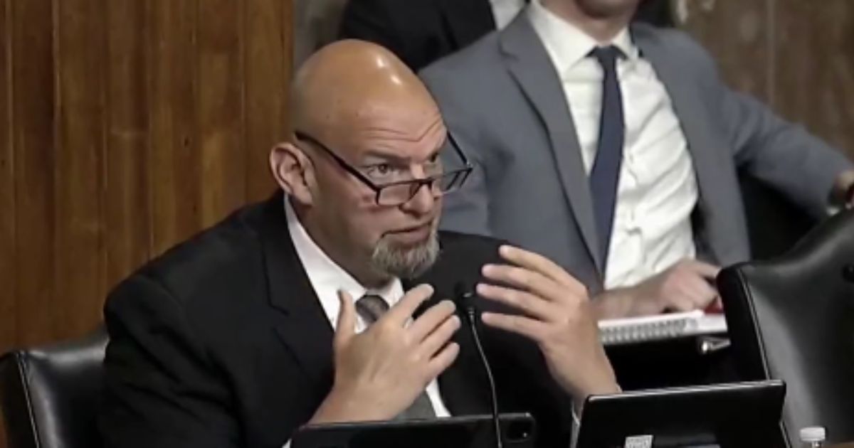 Sen. John Fetterman speaks during a Senate hearing Tuesday.