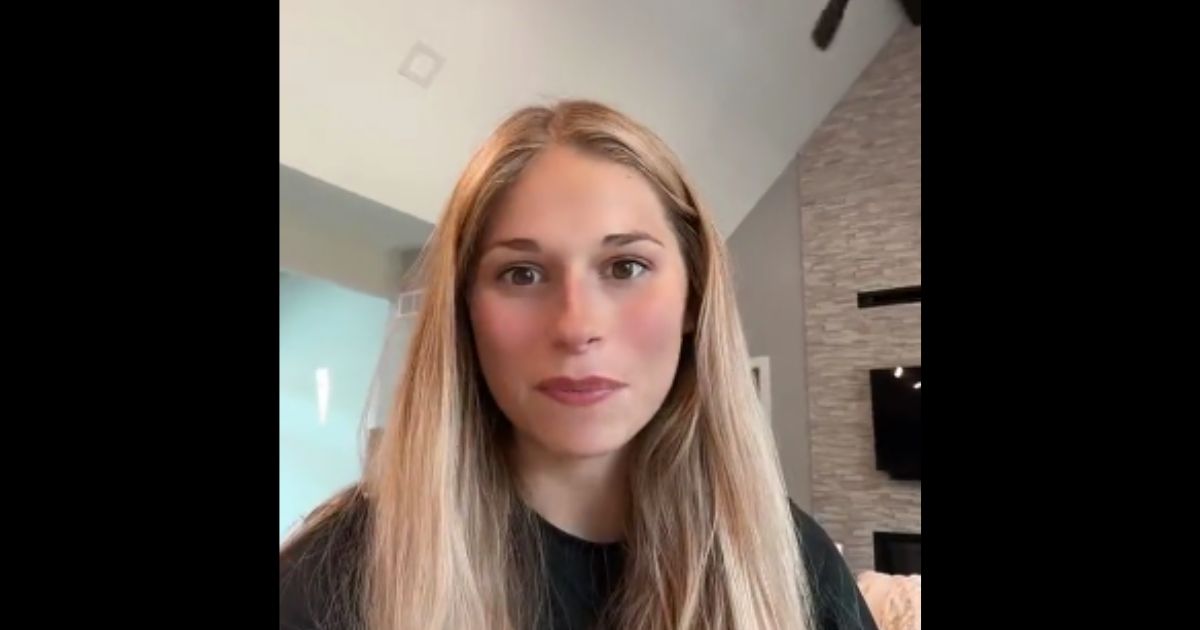 A college student named Olivia posts a TikTok regarding an assignment she received a zero on.