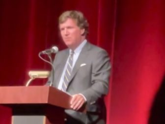 Tucker Carlson speaks at the Oxford Performing Arts Center in Oxford, Alabama, on Thursday.