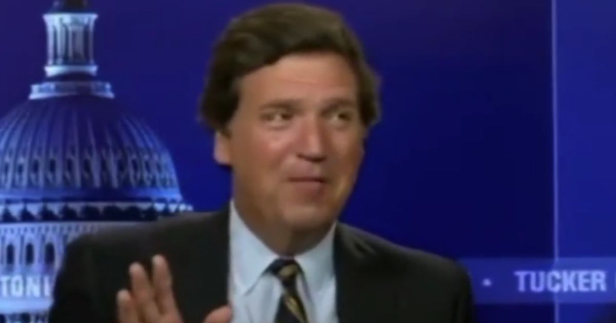 Tucker Carlson is seen in a behind-the-scenes video.