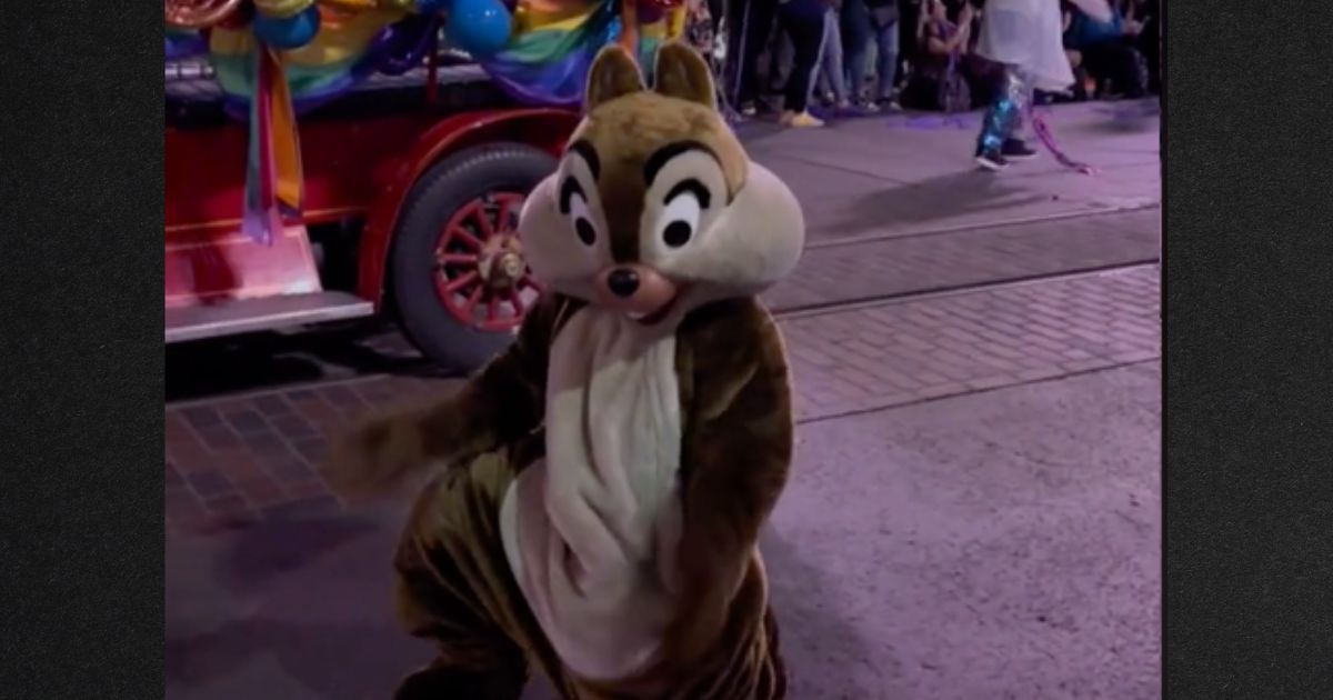 Some questioned the propriety of a dance by the costumed Disney character "Chip" during the theme park's "pride parade."