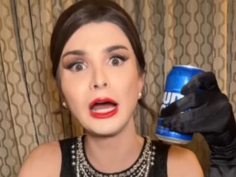 Transgender activist Dylan Mulvaney holds a can of Bud Light during a promotional video.