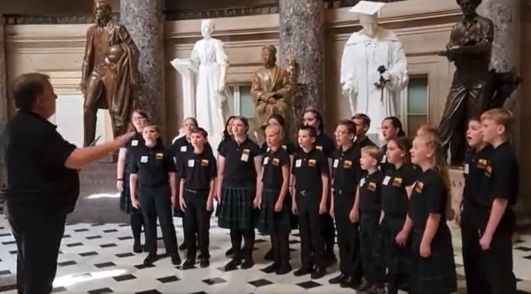 Rushingbrook Children's Choir sings the National Anthem in the Capitol last week.