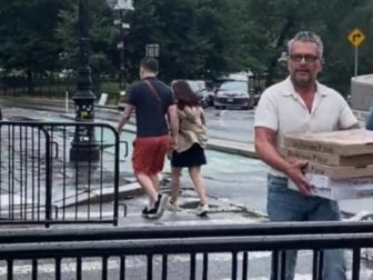 New Yorker Scott LoBaido took to the streets of New York outside of New York City Hall to protest the new tax on coal and wood-fired pizza ovens, chanting "Give us pizza, or give us death."