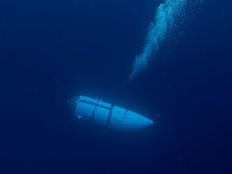 The Titan submersible is seen descending in a photo from the OceanGate website.