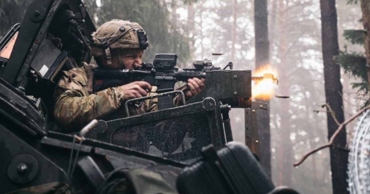 A U.S. soldier engages the enemy during Dragoon Ready 23 at the Joint Multinational Readiness Center in Hohenfels, Germany, on Feb. 1.