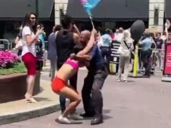 A man, who was aggressively waving a transgender flag during a Moms for Liberty event, was taken down by a police officer in Philadelphia.