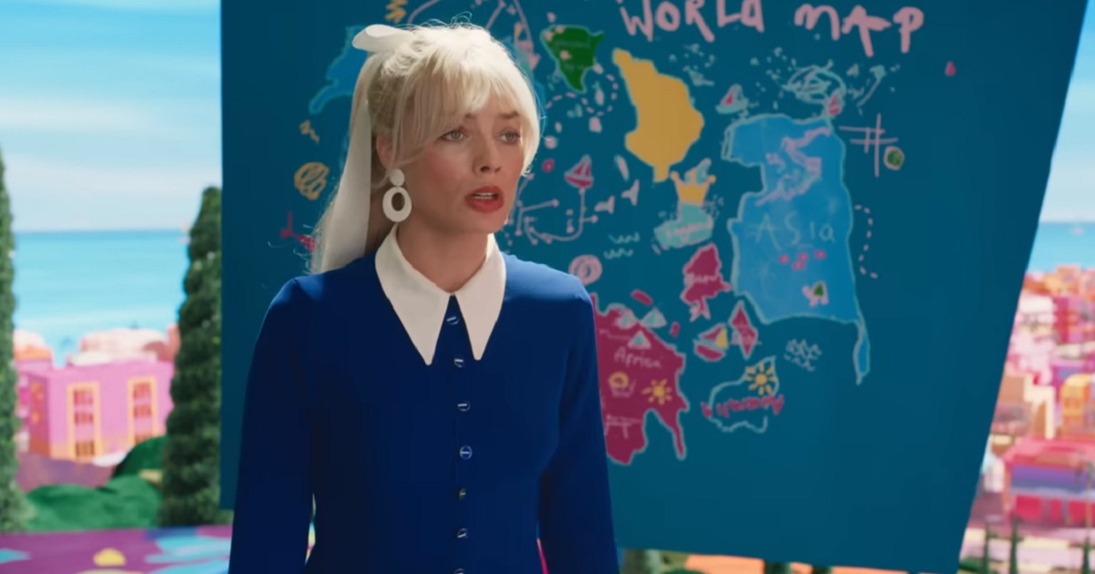 Margot Robbie, as "Barbie," stands in front of a crude world map. Dashes on the map have provoked controversy.