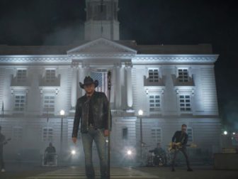 Jason Aldean stands while shooting the new music video for his song “Try That in a Small Town.”